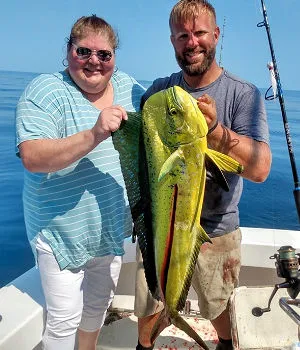 Two Ocean City anglers with large mahi.