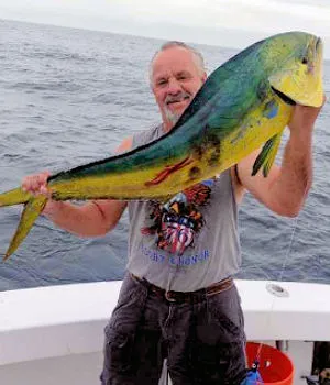 Over-Board angler with large mahi.